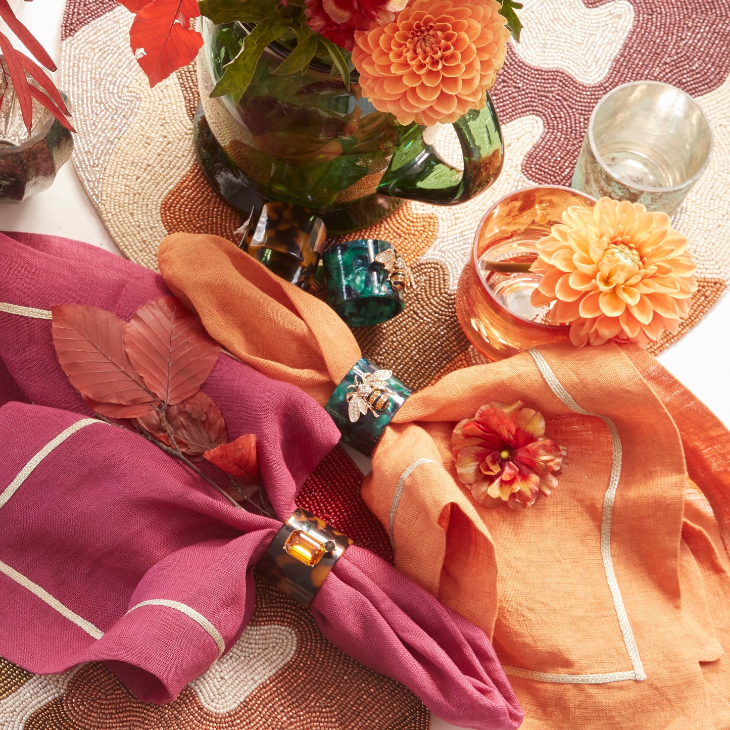 Stripey bee resin napkin rings, green tortoiseshell, set of four