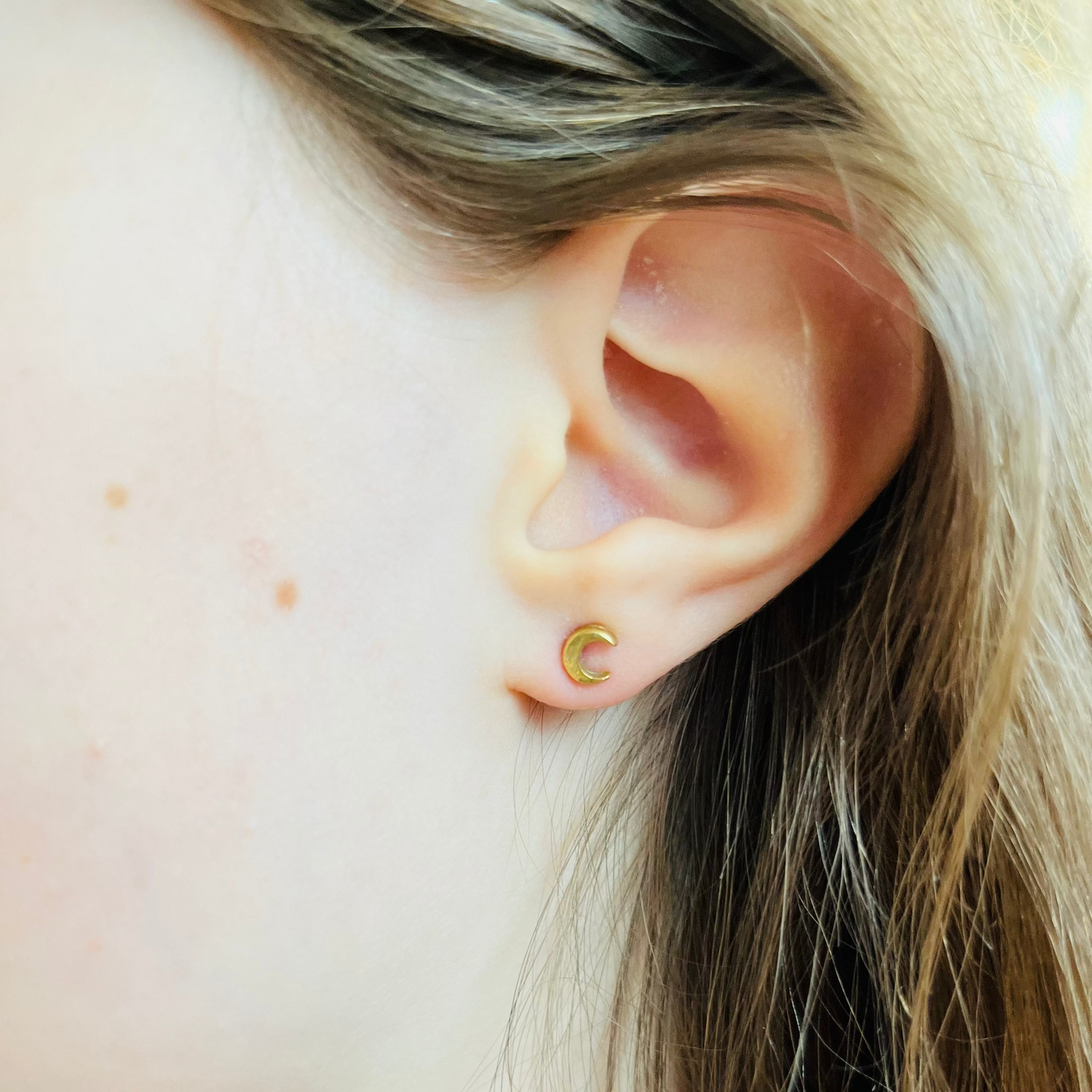 small crescent stud
