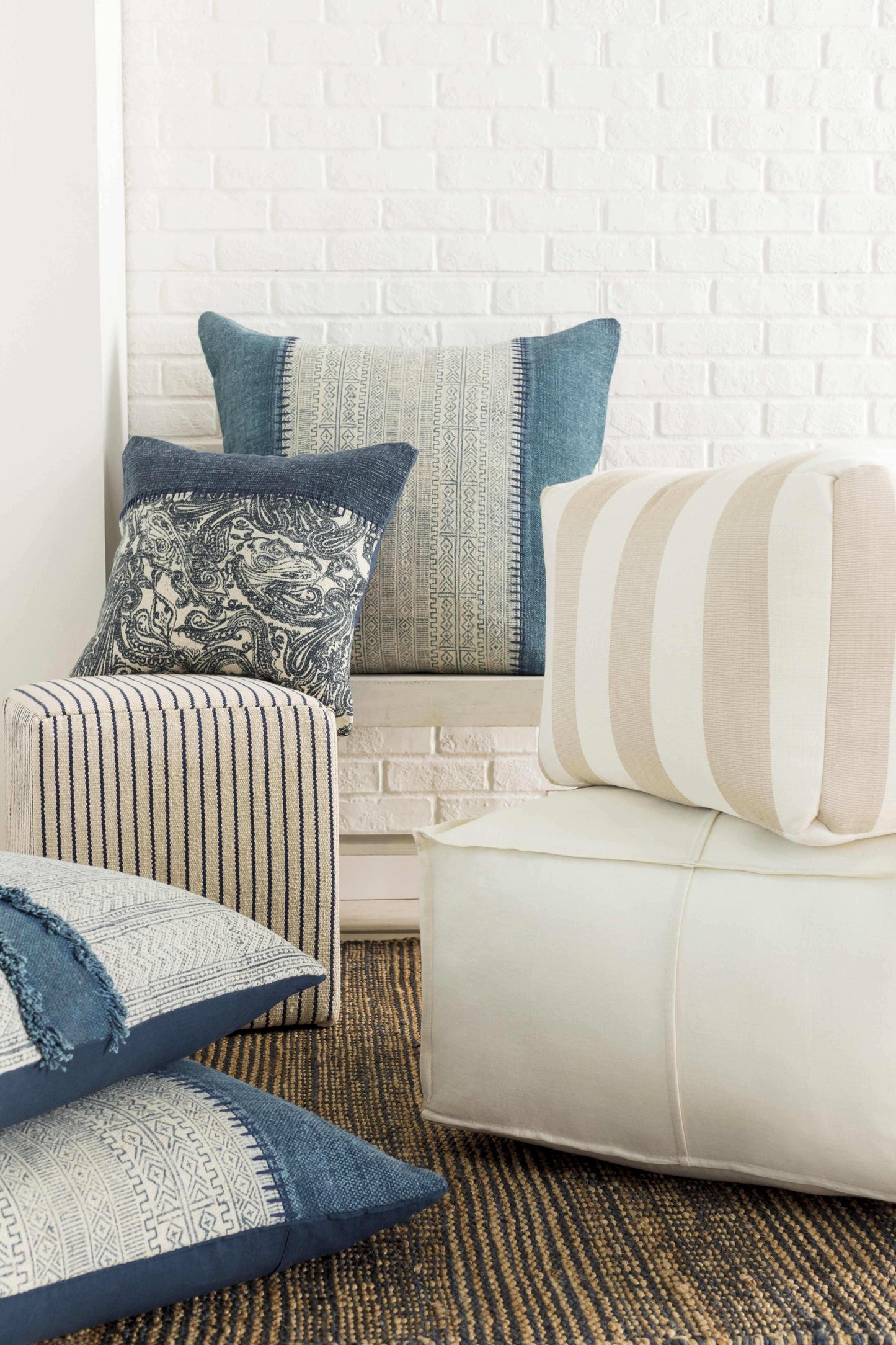 Friendsville Solid & Striped Ivory Pouf