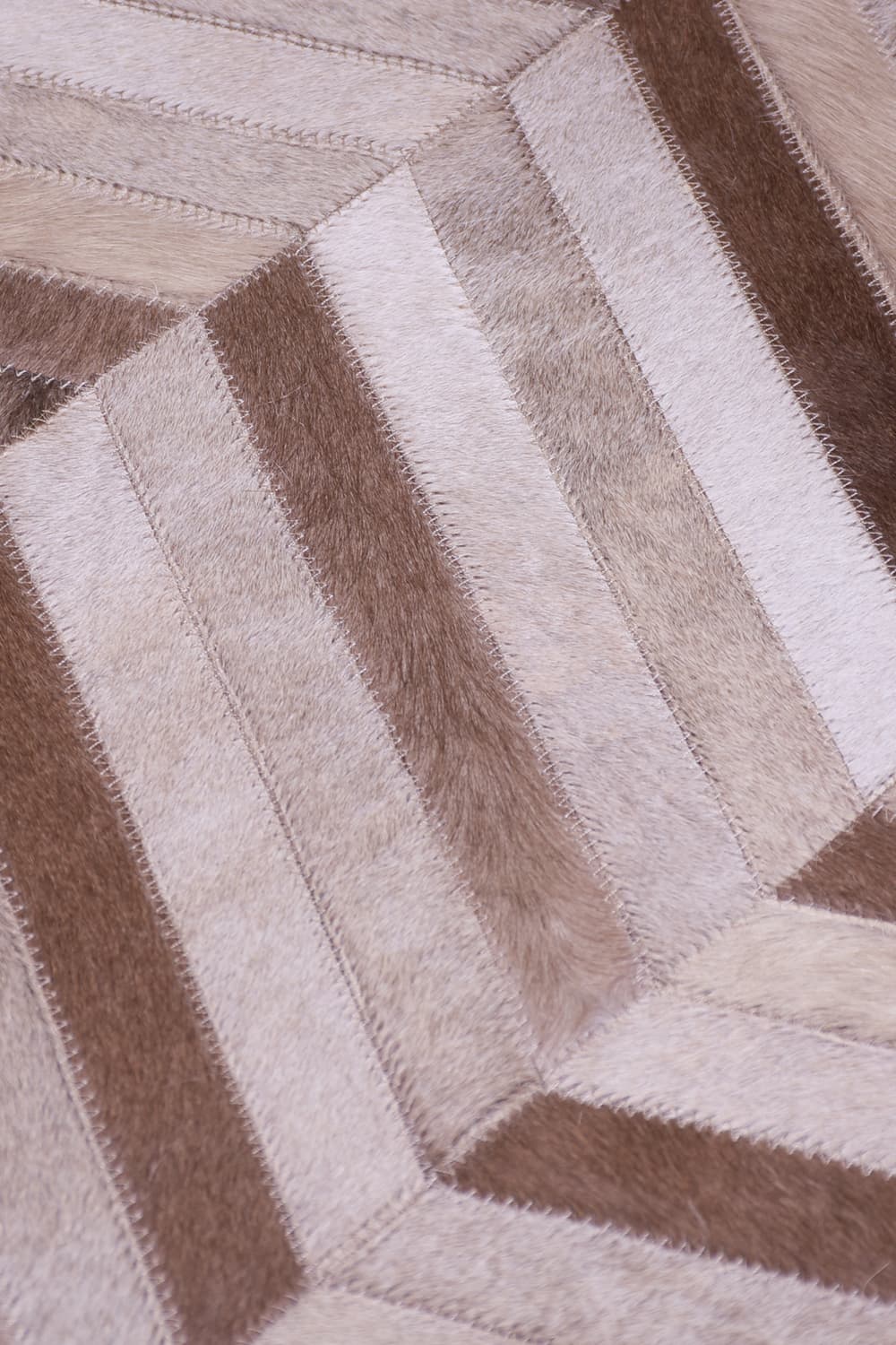 HERRINGBONE LONG – Large Patchwork Cowhide Rug