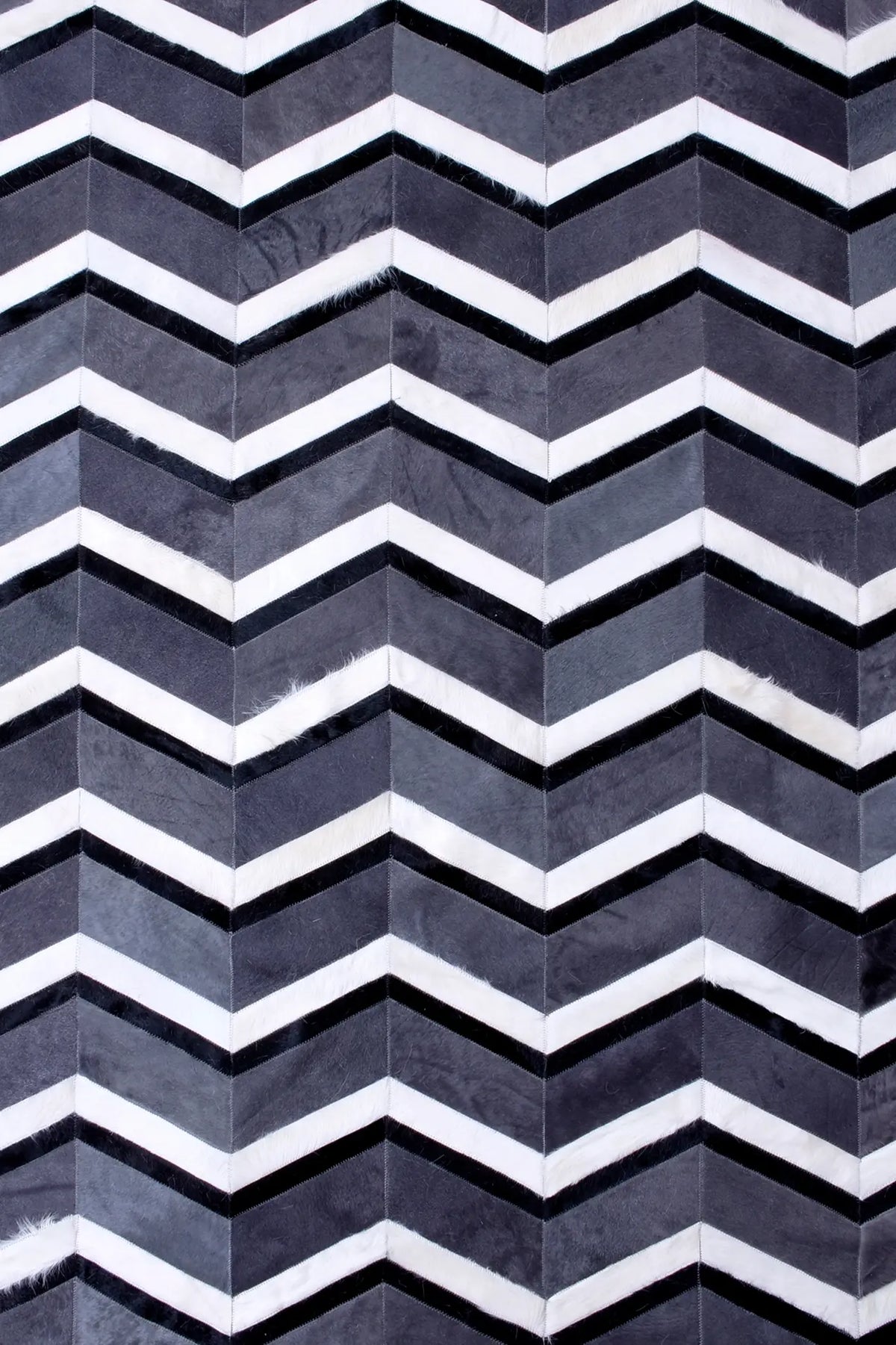 MULTI HERRINGBONE – Chevron Patchwork Cowhide Rug