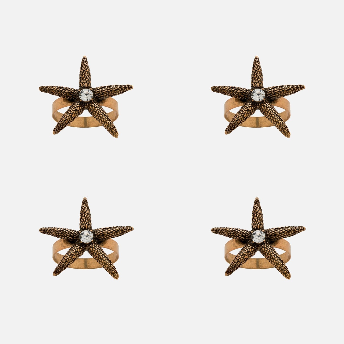 Starfish skinny napkin rings, bronze, set of four